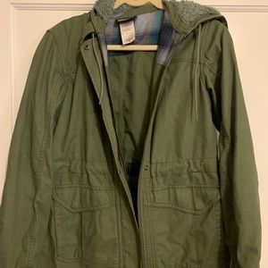 Green Patagonia Jacket. Fleece hood.